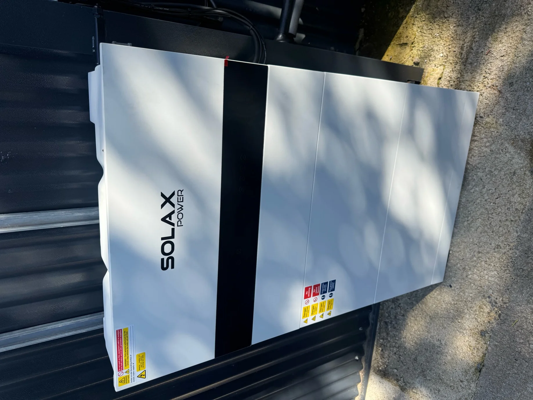 Solax Power battery installed on the wall at the Mouldex site