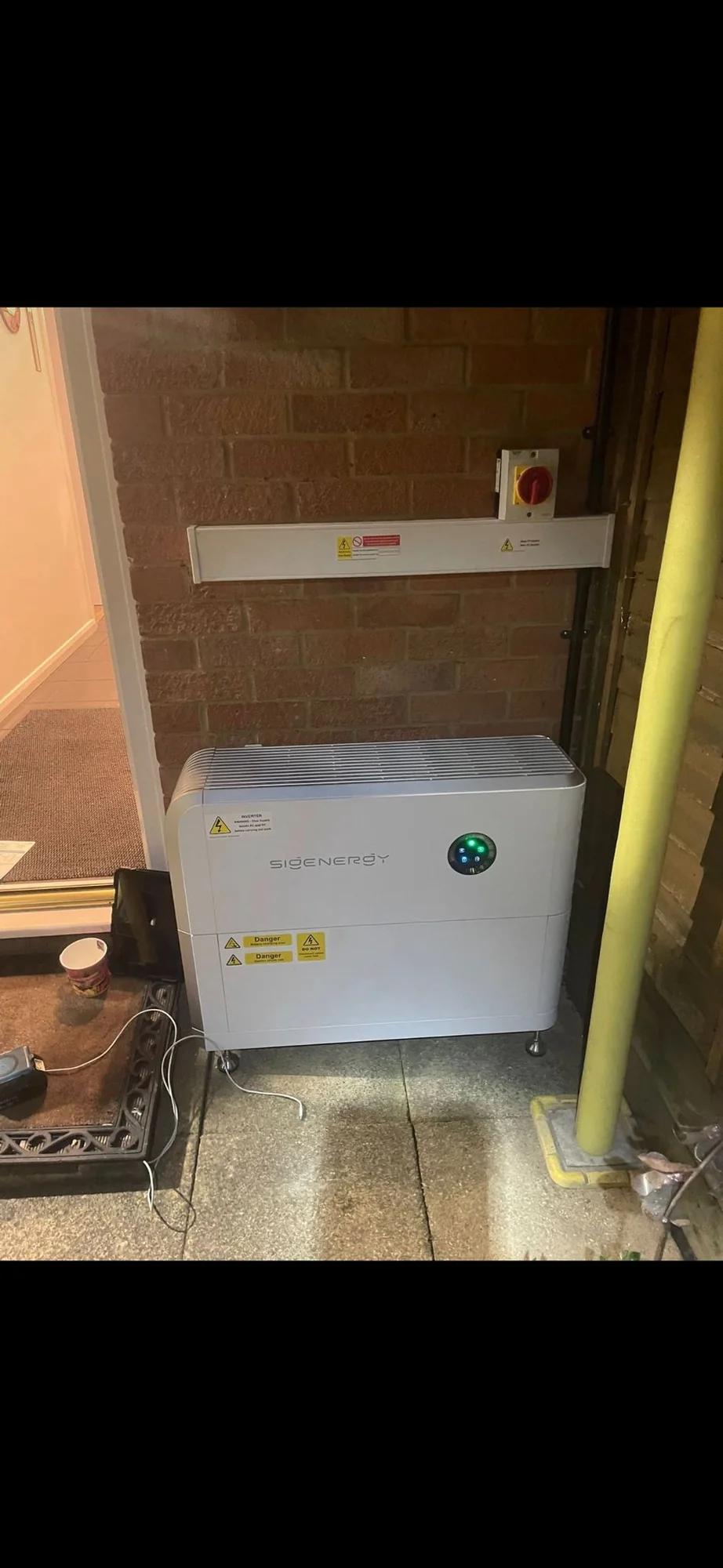 White home battery cabinet installed indoors