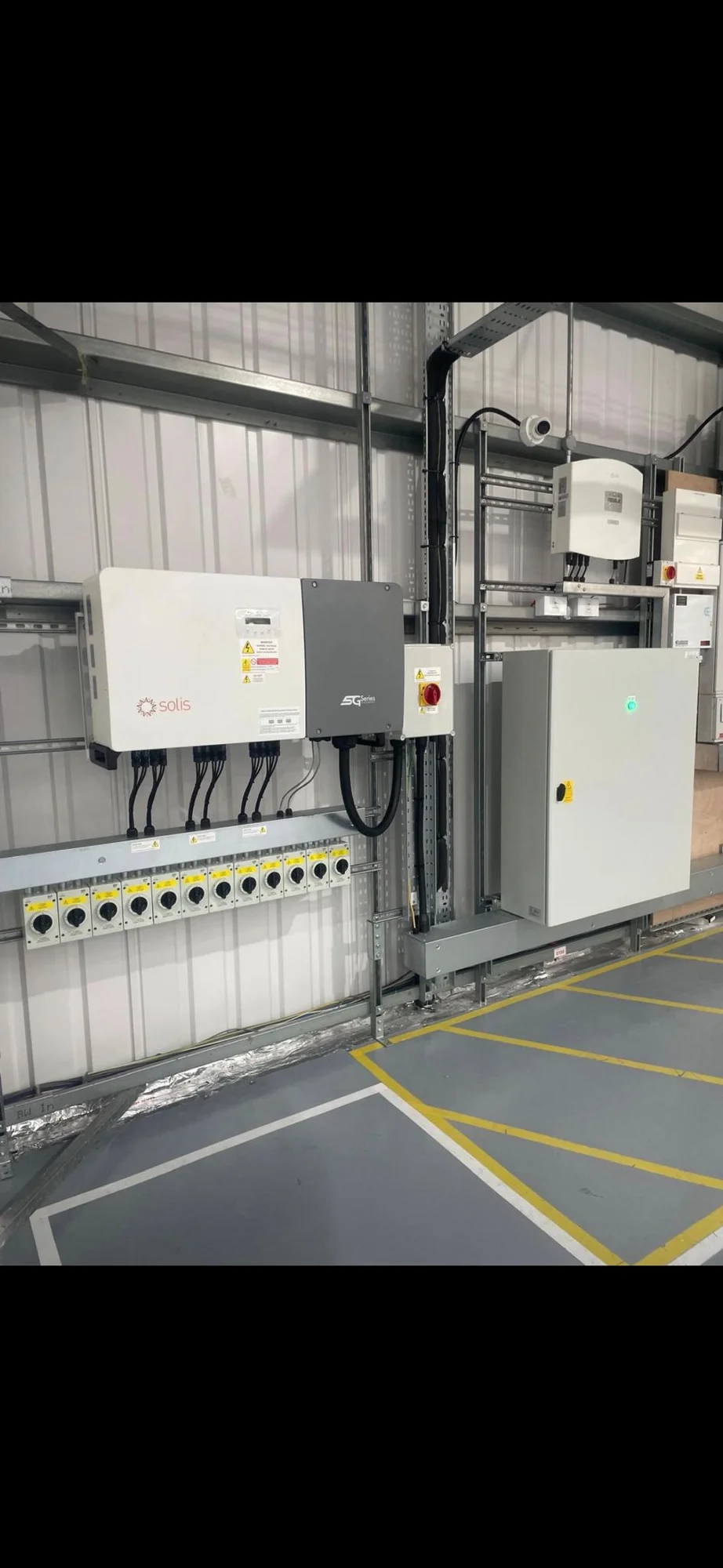 Commercial inverter mounted on a plant-room wall