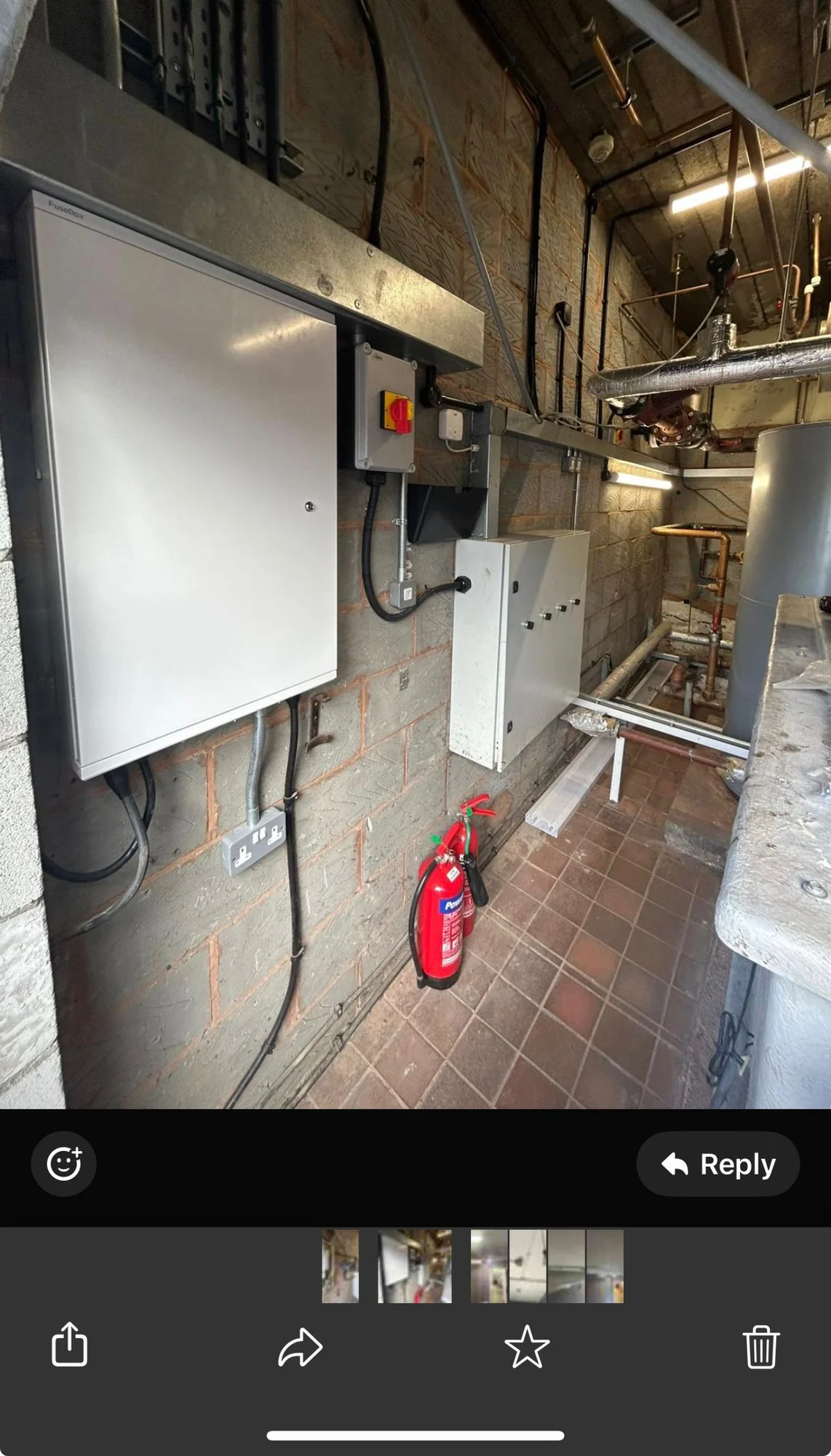 Wall-mounted electrical control box installed and labelled